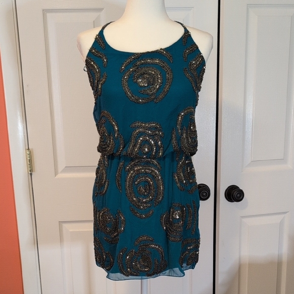 Lotus Threads Dresses & Skirts - Lotus Threads Teal Sleeveless Racerback Dress with Sequin Swirls NWT